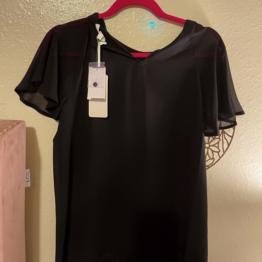 Brand new black sheer blouse